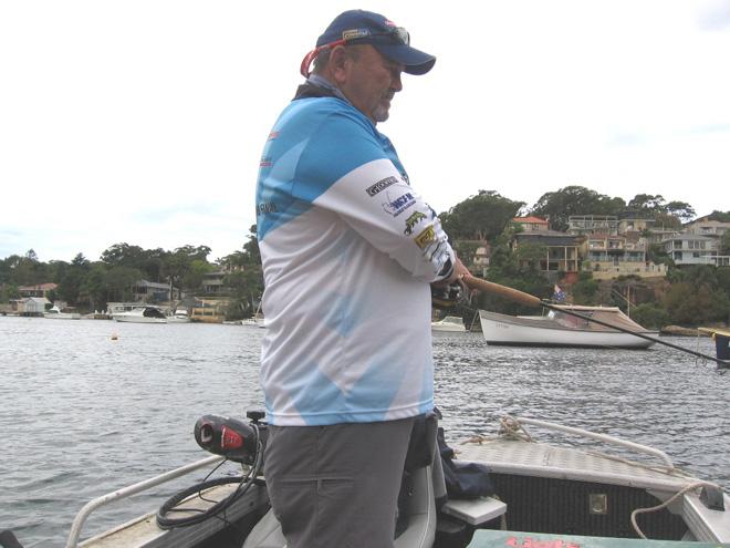 Bill is concentrating on watching his float for a down while chasing luderick at the last hour of the run-out tide © Gary Brown